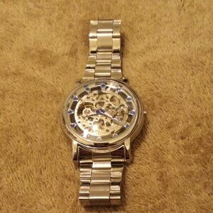 Elegant Silver Watch with Blue Details